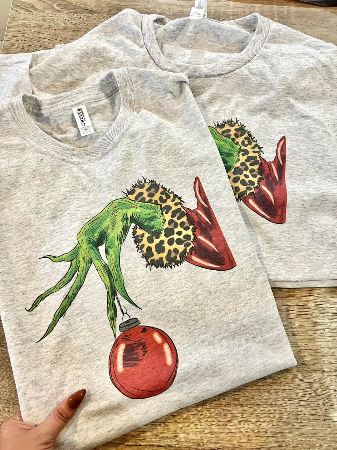 Grinch Hand with Ornament Tee